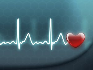 heart and heartbeat symbol on reflective surface